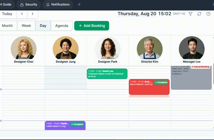 Day view — one column per staff member